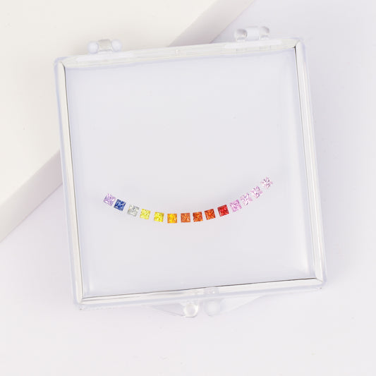 Princess cut colored sapphire necklace set in a stone box