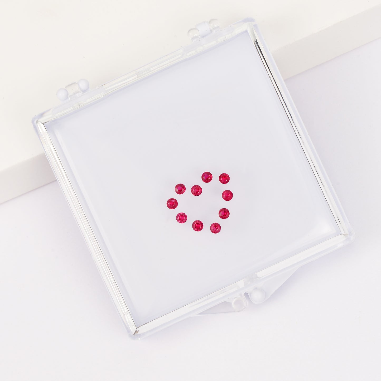 Gemstone set box with round ruby heart pendant.