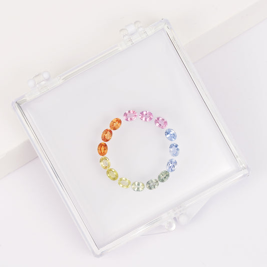 Gemstone set box with 3*4mm oval colored sapphire cluster ring.