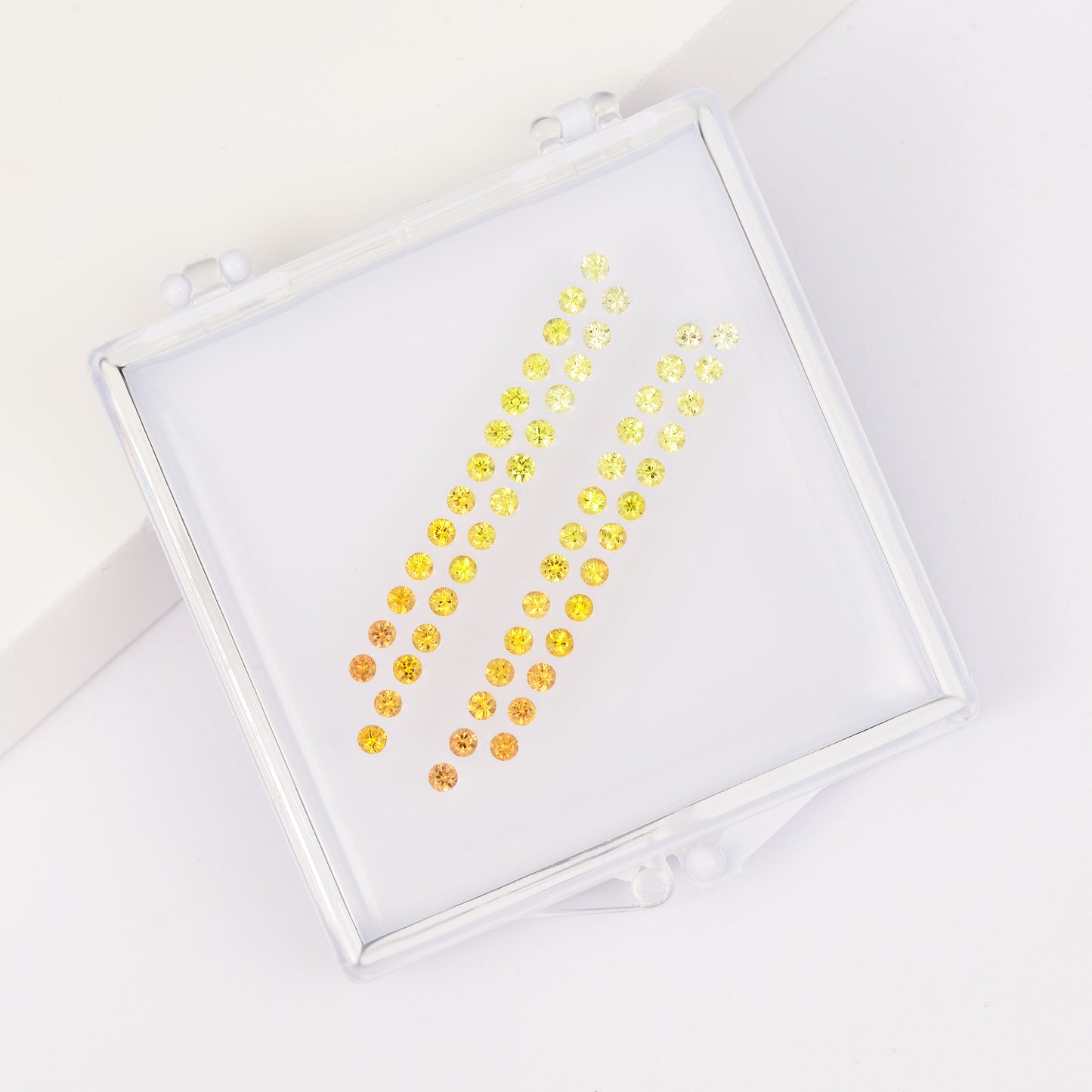 Gemstone set box round orange sapphire ombre earrings