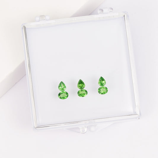 Gemstone set box with a 4*5mm sapphire gourd pendant.
