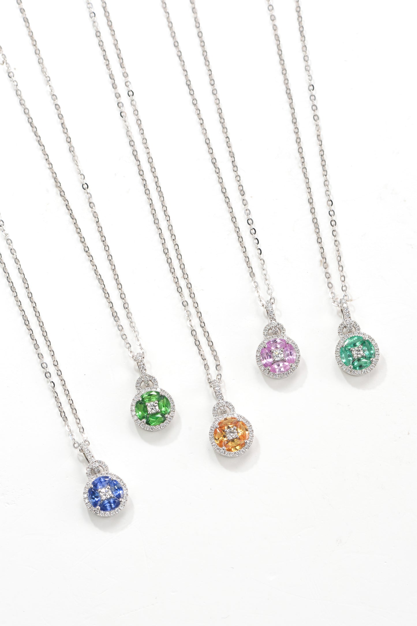 Yellow sapphire and lapis lazuli coin necklace in 18K white gold.