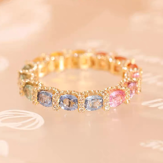 Gemstone set box with 3*4mm oval colored sapphire cluster ring.