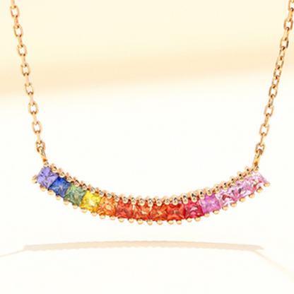 Princess cut colored sapphire necklace set in a stone box