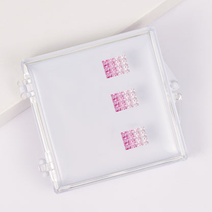 Princess-cut pink and blue sapphire gradient pendant set in a gemstone box.