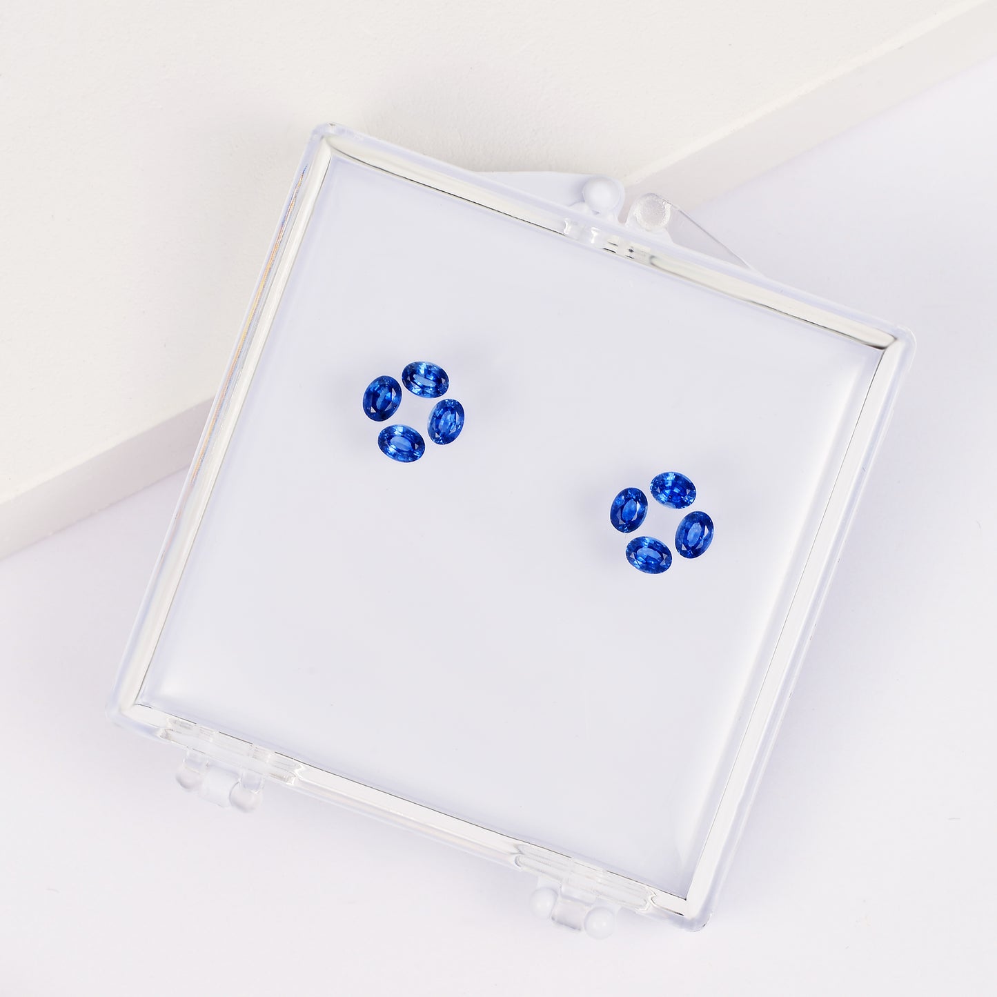 Set with a 3*4mm oval sapphire, four-leaf clover stud earrings.