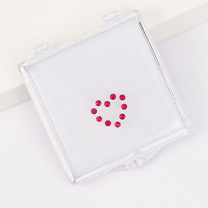 Gemstone set box with round ruby heart pendant.