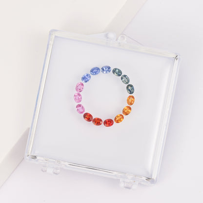Gemstone set box with 3*4mm oval colored sapphire cluster ring.