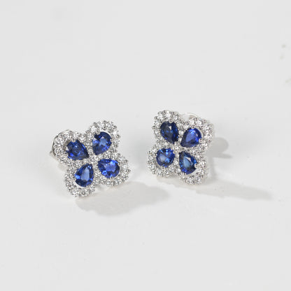 Sapphire four-leaf clover earrings in 18K white gold