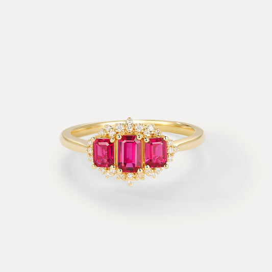 Ruby cluster engagement ring in 18K yellow gold